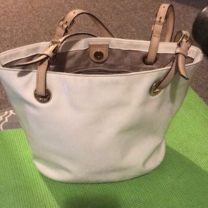 White Michael Kors Jet Set purse.
